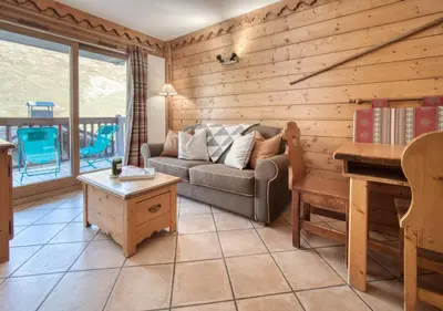 Coin salon dans l'établissement Appartement Ecrin 214