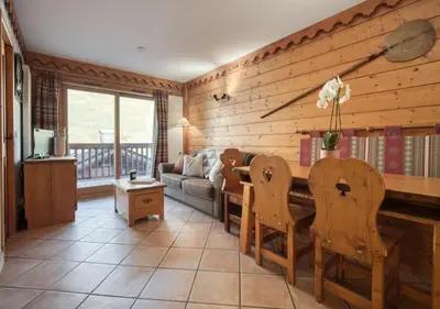 Coin salon dans l'établissement Appartement Ecrin 214