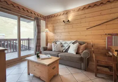 Coin salon dans l'établissement Appartement Ecrin 214