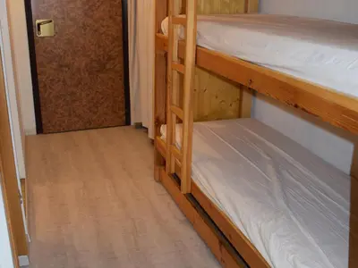 Un ou plusieurs lits dans un hébergement de l'établissement Studio confortable au centre, balcon, 2-4 pers. - FR-1-518-105