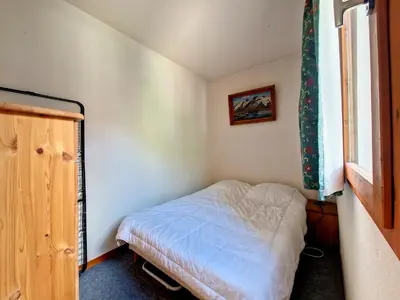 Un ou plusieurs lits dans un hébergement de l'établissement Appartement cosy, accès direct pistes, 2-4 pers - FR-1-518-135