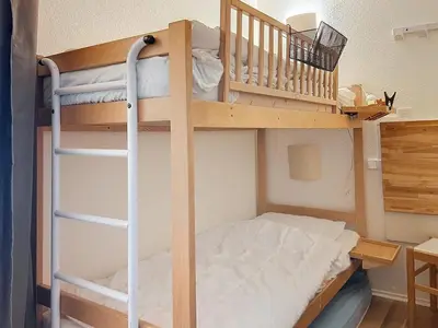Un ou plusieurs lits dans un hébergement de l'établissement Confortable appartement à La Daille, accès direct aux pistes, 4 pers. - FR-1-518-109