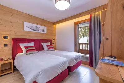Un ou plusieurs lits dans un hébergement de l'établissement Le Hameau des Oursons
