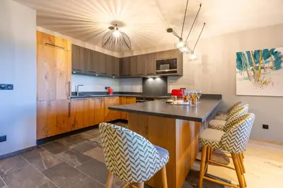 Cuisine ou kitchenette dans l'établissement Le Hameau des Oursons