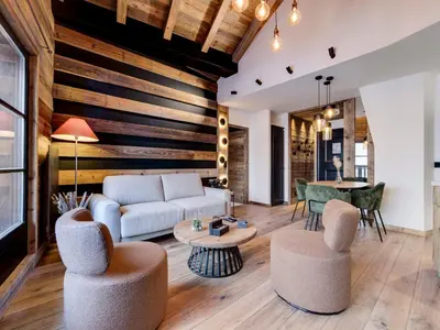 Coin salon dans l'établissement Appartement ski aux pieds avec Wifi à Arc 1950 - FR-1-686-21