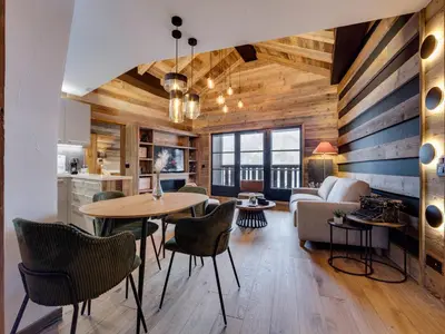 Coin salon dans l'établissement Appartement ski aux pieds avec Wifi à Arc 1950 - FR-1-686-21
