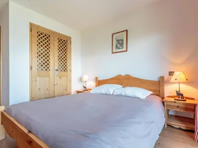 Un ou plusieurs lits dans un hébergement de l'établissement Appartement spacieux 8 pers with Parking & WIFI, proche des pistes - FR-1-352-79
