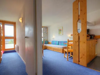 Un ou plusieurs lits dans un hébergement de l'établissement Appartement 5 pers. - Ski aux pieds avec balcon et Wifi - FR-1-346-486