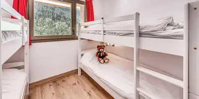 Un ou plusieurs lits dans un hébergement de l'établissement Résidence Les Terrasses De La Vanoise - CASA COLORADO - PREMIUM 4 - Appartement de 4 pièces 8 personnes en rez de chaussée - 72 m2 MAE-1504