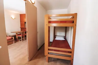 Un ou plusieurs lits dans un hébergement de l'établissement Résidence Rond Point Des Pistes C - Studio·Proche des pistes·Balcon MAE-7564