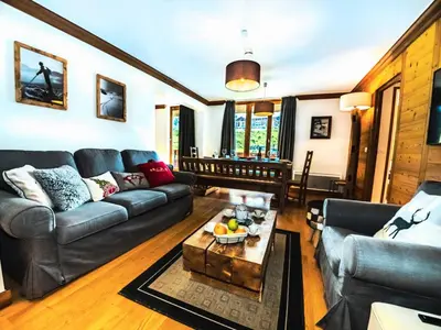 Coin salon dans l'établissement Résidence Les Rives - Charmant appartement au pied des pistes à Lavachet MAE-2374