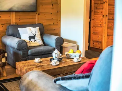 Coin salon dans l'établissement Résidence Les Rives - Charmant appartement au pied des pistes à Lavachet MAE-2374