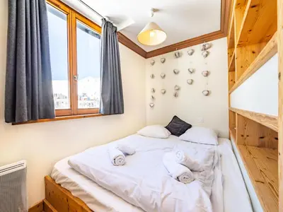 Un ou plusieurs lits dans un hébergement de l'établissement Résidence Les Rives - Charmant appartement au pied des pistes à Lavachet MAE-2374