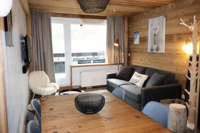 Coin salon dans l'établissement Résidence Curling A Tour - Appartement avec terrasse au sud à Tignes VC MAE-2404
