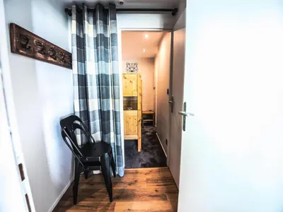 Coin salon dans l'établissement Résidence Rond Point Des Pistes B - Appartement rénové·Départ et retour ski aux pieds· MAE-2414