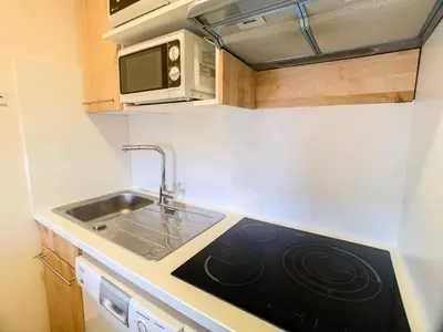 Cuisine ou kitchenette dans l'établissement Résidence Curling B Tour - 3 pièces au centre du Val Claret MAE-2444