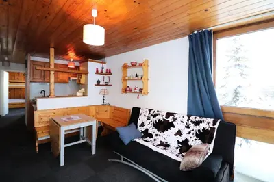 Coin salon dans l'établissement Résidence Roches Rouges A - Appartement calme et près des pistes. MAE-2474