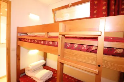 Un ou plusieurs lits dans un hébergement de l'établissement Résidence Hameau Du Borsat 3 - Duplex rénové & lumineux · Ski au pied MAE-2514
