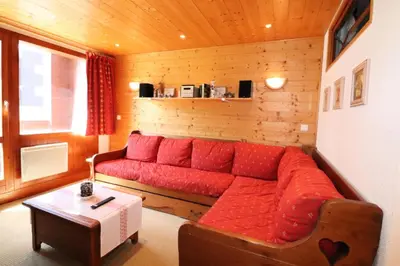 Coin salon dans l'établissement Résidence Hameau Du Borsat 3 - Duplex rénové & lumineux · Ski au pied MAE-2514