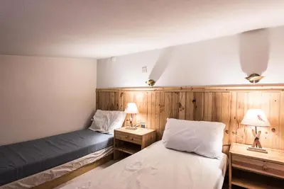 Un ou plusieurs lits dans un hébergement de l'établissement Résidence Rosuel - Appartement avec une vue dégagée sur le lac MAE-2544