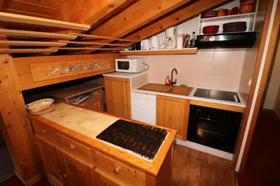 Cuisine ou kitchenette dans l'établissement Résidence Rosset - Chaleureux 2 pièces proche des pistes MAE-2574