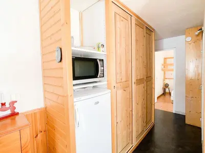 Cuisine ou kitchenette dans l'établissement Résidence Prariond B - 2 pièces accès direct sur les pistes MAE-2584
