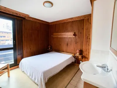 Un ou plusieurs lits dans un hébergement de l'établissement Résidence Grand Tichot A - Appartement dans une résidence avec ascenseur MAE-2644