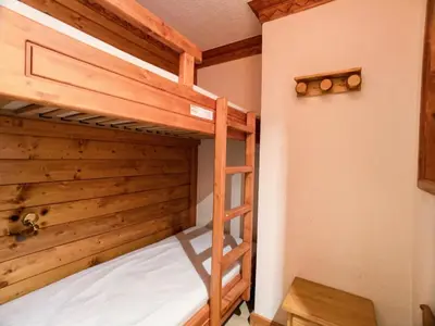 Un ou plusieurs lits dans un hébergement de l'établissement Résidence Grand Tichot A - Appartement dans une résidence avec ascenseur MAE-2644