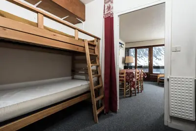 Un ou plusieurs lits dans un hébergement de l'établissement Résidence Bec Rouge - Appartement spacieux·Skis aux pieds·Balcon MAE-2674