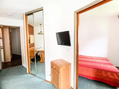 Un ou plusieurs lits dans un hébergement de l'établissement Résidence Hameau Du Borsat 3 - 2 pièces cabine 35-45m² MAE-2704