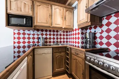 Cuisine ou kitchenette dans l'établissement Résidence Supertignes - Appartement confortable·Proches de pistes·Balcon MAE-2724