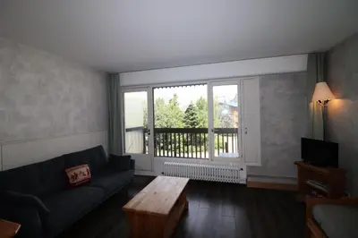 Coin salon dans l'établissement Chalet De La Tour - Appartement lumineux · Proche pistes et commerces MAE-2814