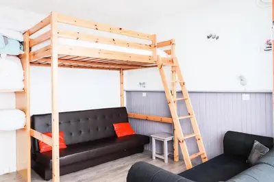 Un ou plusieurs lits superposés dans un hébergement de l'établissement Résidence Bec Rouge - Appartement lumineux·Accès direct aux pistes·Balco MAE-2824