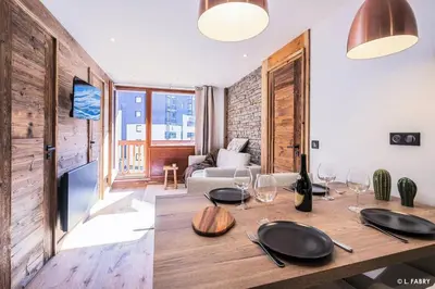 Coin salon dans l'établissement Résidence Hameau Du Borsat 1& 2 - Appartement 6 personnes - Au pied des pistes MAE-2734