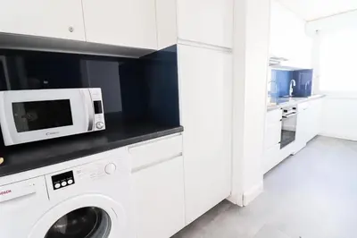 Cuisine ou kitchenette dans l'établissement Résidence Bec Rouge - Appartement lumineux·Skis aux pieds·Balcon MAE-2744
