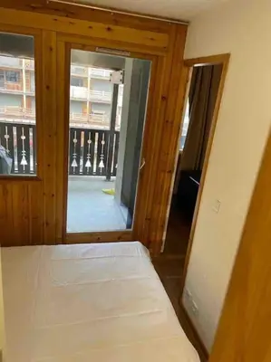 Un ou plusieurs lits dans un hébergement de l'établissement Central 3 bedroom chalet with balcony