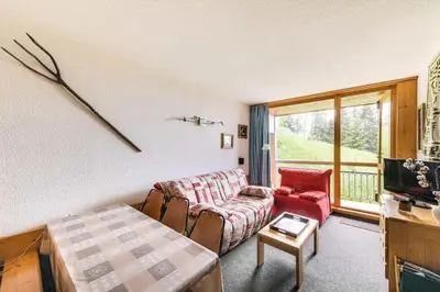 Télévision ou salle de divertissement dans l'établissement Résidence Armoise - Appartement de charme 2 pièces / 6 personnes à Arc 1800 en centre station, proche des pistes et des commerces, dans le village d MAE-1694