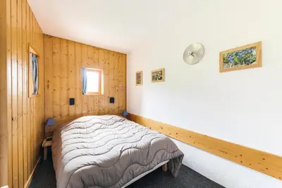 Un ou plusieurs lits dans un hébergement de l'établissement Résidence Armoise - Appartement de charme 2 pièces / 6 personnes à Arc 1800 en centre station, proche des pistes et des commerces, dans le village d MAE-1694