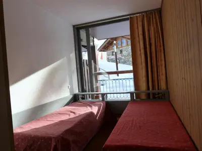 Un ou plusieurs lits dans un hébergement de l'établissement Résidence Nova - Appartement 2 pièces 6 personnes proche des pistes, des commerces, de la garderie et de l'ESF au centre de la station d’Arc 1800 MAE-1713