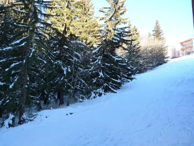 L'établissement Résidence Aiguille Grive Bat I - Duplex pour 5 personnes à Arc 1800 dans le village de Charmettoger, skis aux pieds MAE-1735 en hiver