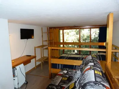 Télévision ou salle de divertissement dans l'établissement Résidence Aiguille Grive Bat I - Duplex pour 5 personnes à Arc 1800 dans le village de Charmettoger, skis aux pieds MAE-1735