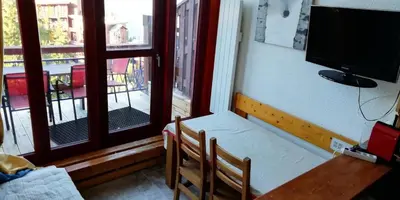Télévision ou salle de divertissement dans l'établissement Résidence Aiguille Grive Bat I - Duplex pour 5 personnes à Arc 1800 dans le village de Charmettoger, skis aux pieds MAE-1738