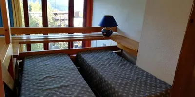 Un ou plusieurs lits dans un hébergement de l'établissement Résidence Aiguille Grive Bat I - Duplex pour 5 personnes à Arc 1800 dans le village de Charmettoger, skis aux pieds MAE-1738