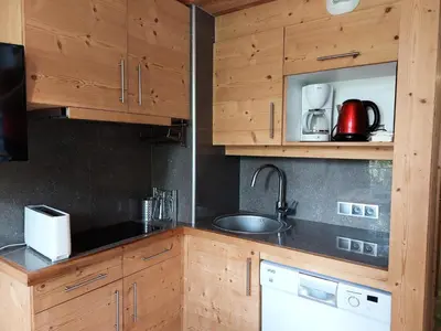 Cuisine ou kitchenette dans l'établissement Résidence Archeboc - Appartement 2 pièces/5 personnes à Arc 1800 proche des pistes dans le village de Charmettoger MAE-1758
