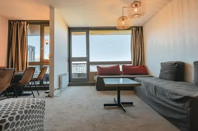 Coin salon dans l'établissement Résidence Arandelieres - Beau duplex pour 8 personnes, au coeur de la station d'Arc 1800 avec une vue plongeante sur la vallée MAE-2173