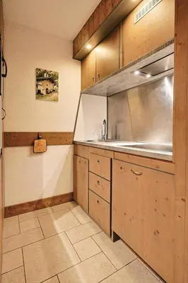 Cuisine ou kitchenette dans l'établissement Résidence Arandelieres - Beau duplex pour 8 personnes, au coeur de la station d'Arc 1800 avec une vue plongeante sur la vallée MAE-2173