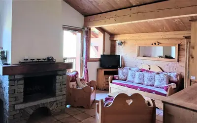 Télévision ou salle de divertissement dans l'établissement Résidence Le Chamois - Très bel appartement de style montagne, spacieux situé à proximité des pistes MAE-3544