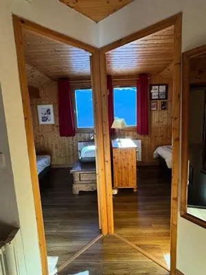 Un ou plusieurs lits dans un hébergement de l'établissement Chalet Camomille - Confortable chalet dans un quartier calme avec une vue imprenable sur la vallée et le Mont Blanc MAE-0967