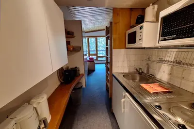 Cuisine ou kitchenette dans l'établissement Studio in Front De Neige Charvet Arc 1800