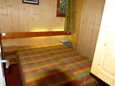 Un ou plusieurs lits dans un hébergement de l'établissement Résidence Ruitor Arc 1800 - Appartement 2 pièces 5 personnes dans une résidence calme, proche du télécabine dans le village de Charmettoger à Arc 1800 MAE-2190